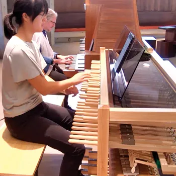 Annie Gao performs with her Clavion carillon practice keyboard, All Saints Episcopal Church, Palo Alto, California